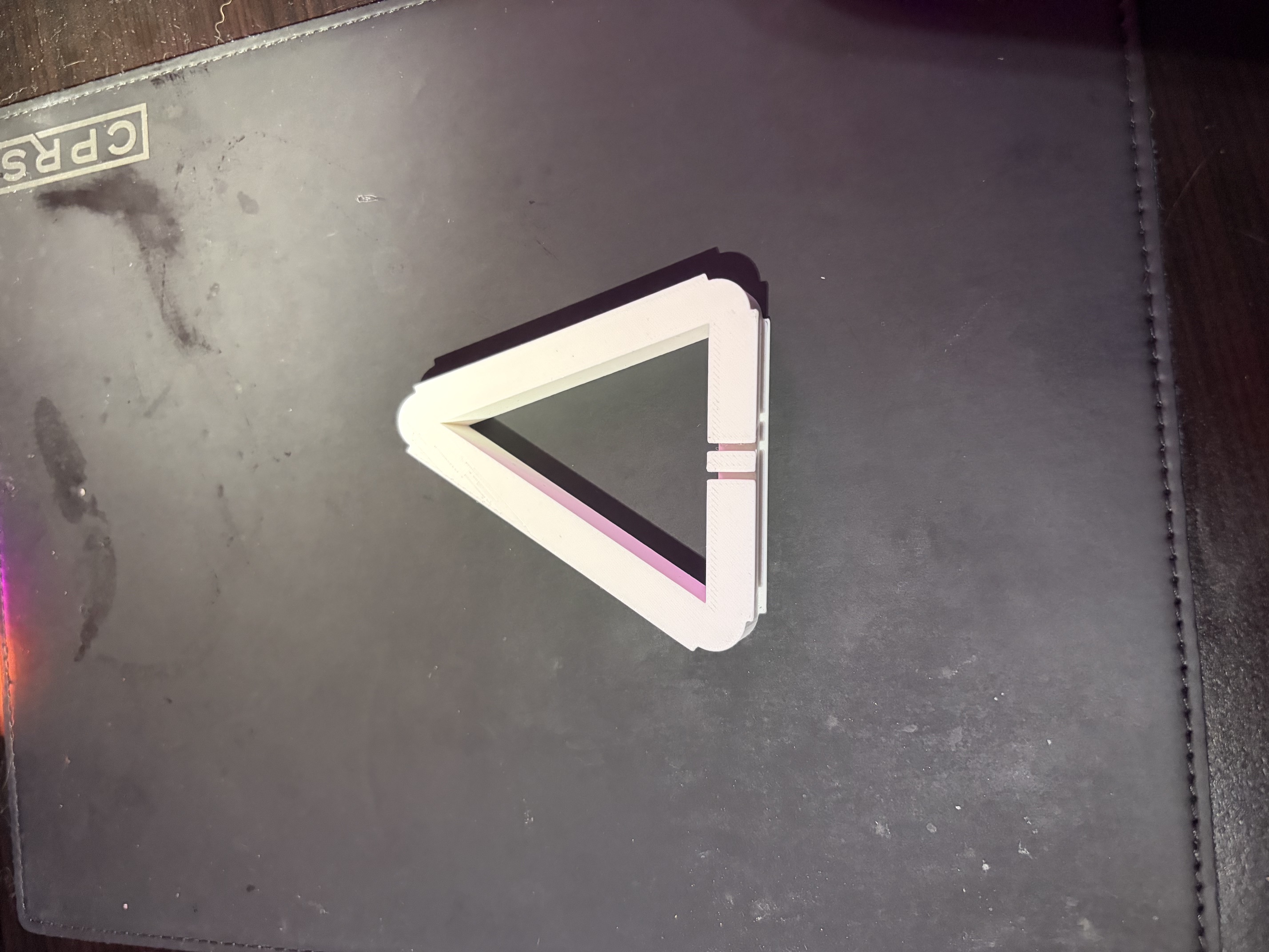 Triangular ear bud storage